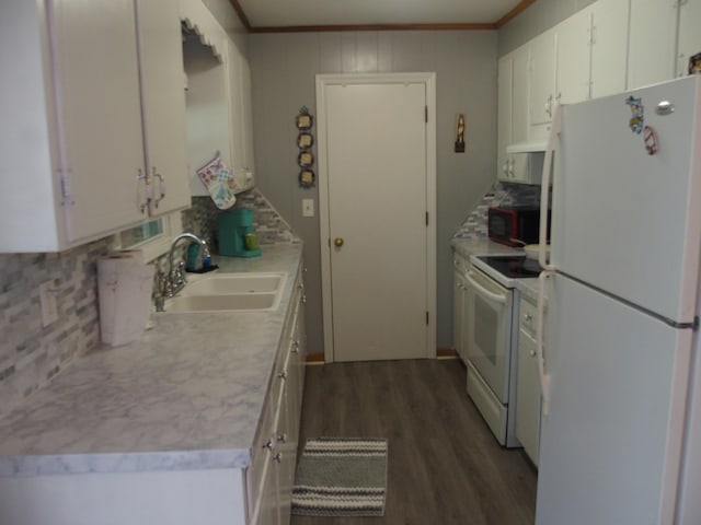 107 Lilac Dr, Shawsville, VA 24162 - kitchen with white appliances, a sink, crown molding, backsplash, and dark wood-style floors