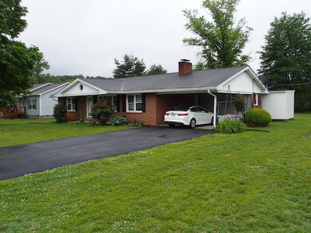 107 Lilac Dr, Shawsville, VA 24162 - single story home featuring driveway, a chimney, a carport, and a front lawn