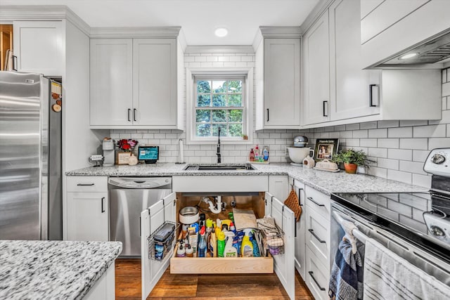 60 Surber Dr, Moneta, VA 24121 - kitchen with stainless steel appliances, recessed lighting, white cabinetry, decorative backsplash, and dark wood finished floors