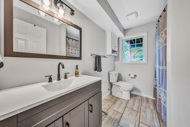 60 Surber Dr, Moneta, VA 24121 - full bath with toilet, baseboards, and vanity