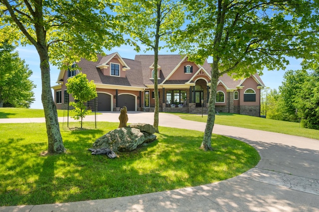 493 Pops Peak Rd, Fancy Gap, VA 24328 - view of front of home with curved driveway, stone siding, a front yard, and a shingled roof
