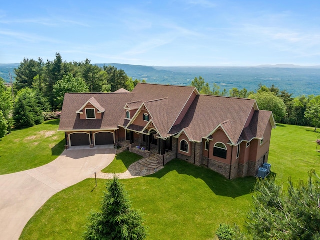 493 Pops Peak Rd, Fancy Gap, VA 24328 - view of front facade with stone siding, driveway, and a front yard