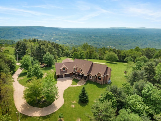 493 Pops Peak Rd, Fancy Gap, VA 24328 - aerial view of property and surrounding area featuring a heavily wooded area and a mountain backdrop