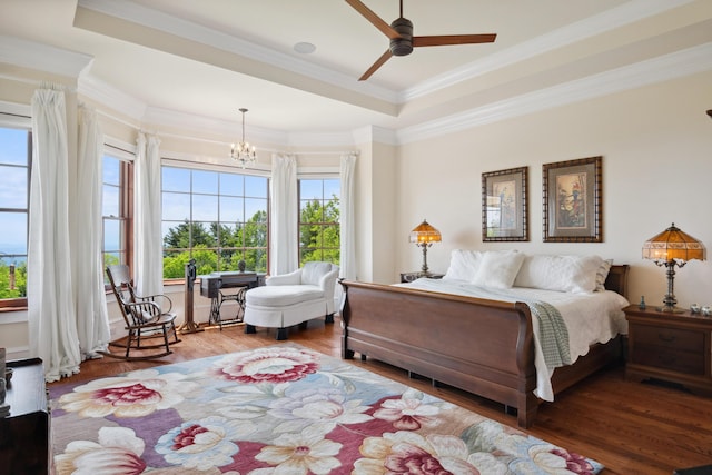 493 Pops Peak Rd, Fancy Gap, VA 24328 - bedroom with multiple windows, wood finished floors, a chandelier, a tray ceiling, and crown molding