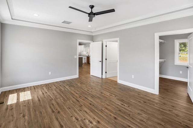 105 Belvior Cir, Moneta, VA 24121 - unfurnished bedroom featuring ornamental molding, a walk in closet, dark wood-style flooring, recessed lighting, and ceiling fan