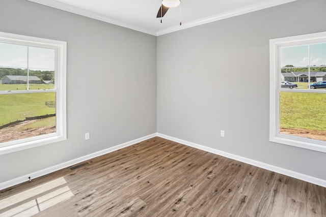 105 Belvior Cir, Moneta, VA 24121 - empty room with crown molding, wood finished floors, and a ceiling fan