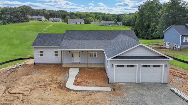 105 Belvior Cir, Moneta, VA 24121 - view of front of home featuring roof with shingles, a porch, a garage, and gravel driveway