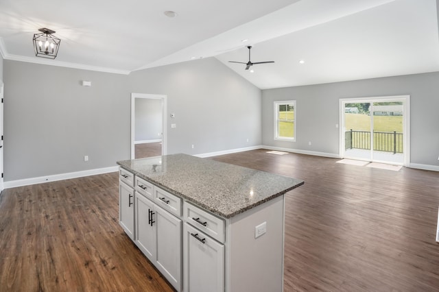 105 Belvior Cir, Moneta, VA 24121 - kitchen featuring open floor plan, ceiling fan, a kitchen island, white cabinets, and high vaulted ceiling