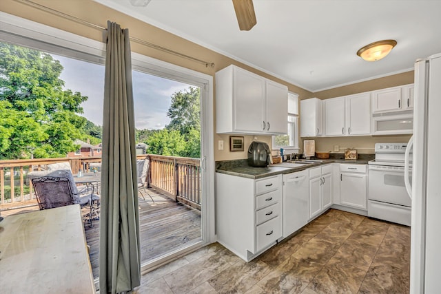 2515 Colonial Ave SW, Roanoke, VA 24015 - kitchen featuring white appliances, white cabinetry, ornamental molding, a sink, and a ceiling fan