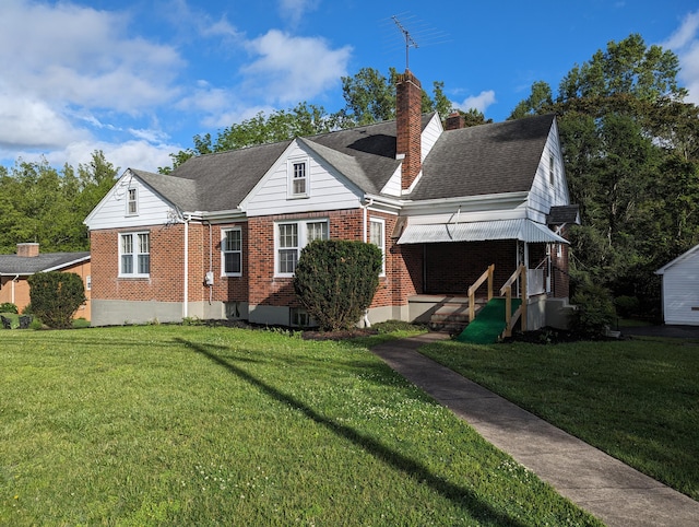 1987 Franklin St, Rocky Mount, VA 24151 - bungalow-style home with brick siding, a chimney, a front yard, and a shingled roof