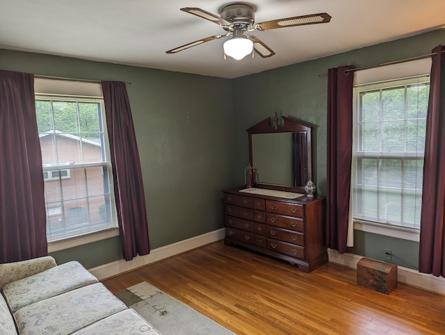1987 Franklin St, Rocky Mount, VA 24151 - bedroom with wood finished floors, ceiling fan, and baseboards