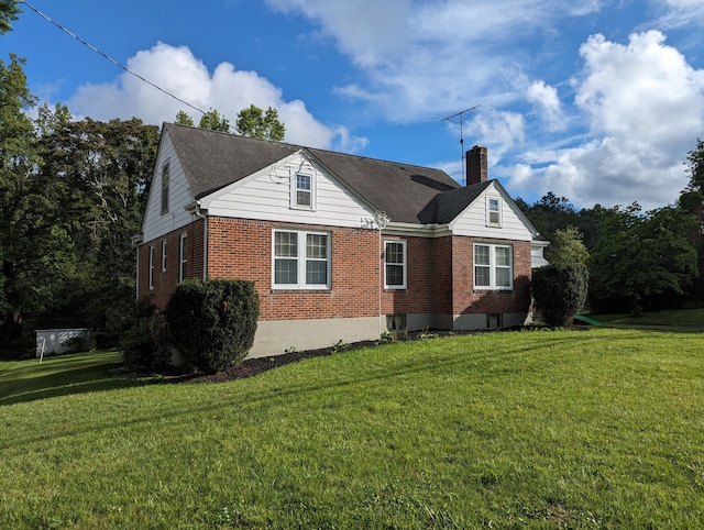 1987 Franklin St, Rocky Mount, VA 24151 - view of side of home with brick siding, a chimney, and a yard