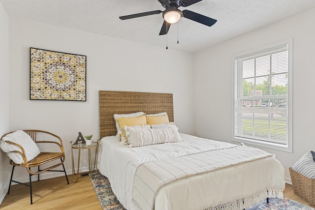 1503 Cassell Ln, Bedford, VA 24523 - bedroom featuring light wood finished floors, ceiling fan, and baseboards