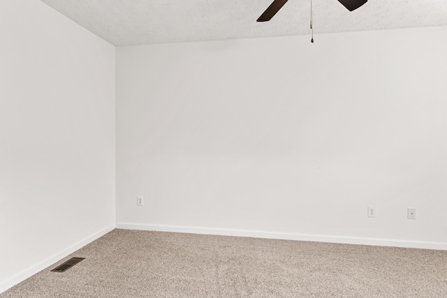 1503 Cassell Ln, Bedford, VA 24523 - carpeted empty room with a ceiling fan, baseboards, and a textured ceiling