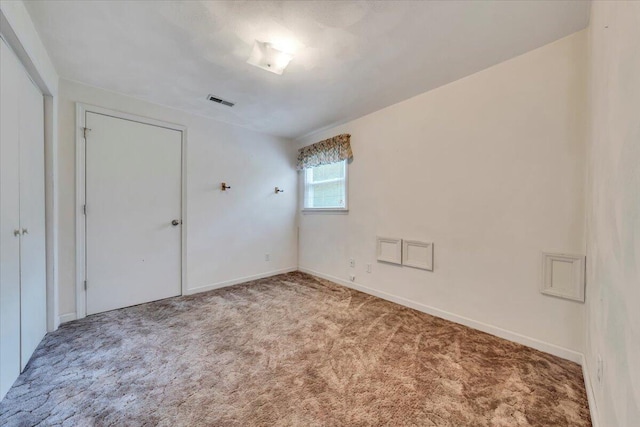 112 N Rome Dr, Roanoke, VA 24019 - unfurnished bedroom with carpet floors, baseboards, and a closet