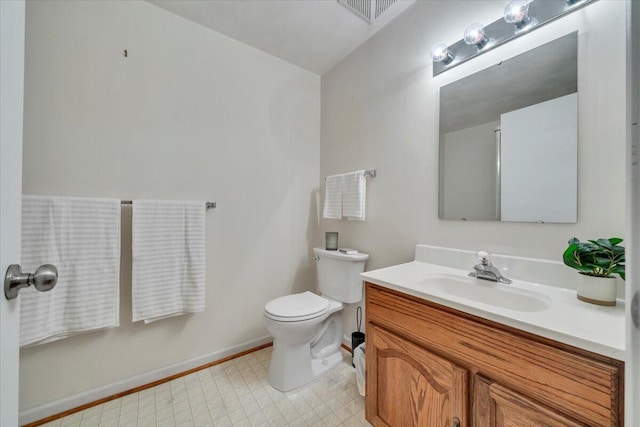 112 N Rome Dr, Roanoke, VA 24019 - bathroom featuring toilet, vanity, and baseboards