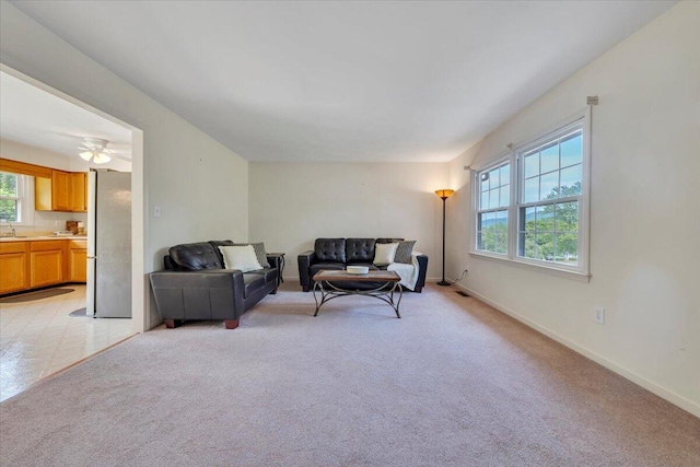 112 N Rome Dr, Roanoke, VA 24019 - living area with healthy amount of natural light, light colored carpet, and baseboards