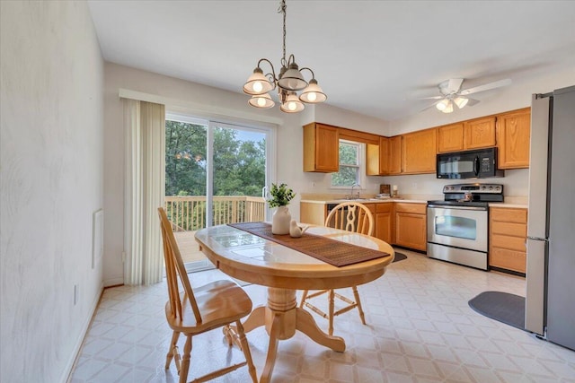 112 N Rome Dr, Roanoke, VA 24019 - kitchen featuring stainless steel range with electric cooktop, black microwave, healthy amount of natural light, and light flooring