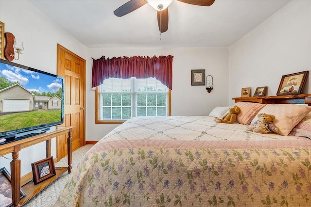 338 White Oak Ln, New Castle, VA 24127 - bedroom featuring ceiling fan, light colored carpet, and baseboards