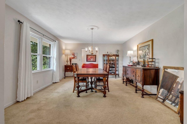 3412 Canter Cir, Roanoke, VA 24018 - carpeted dining area with a chandelier and baseboards