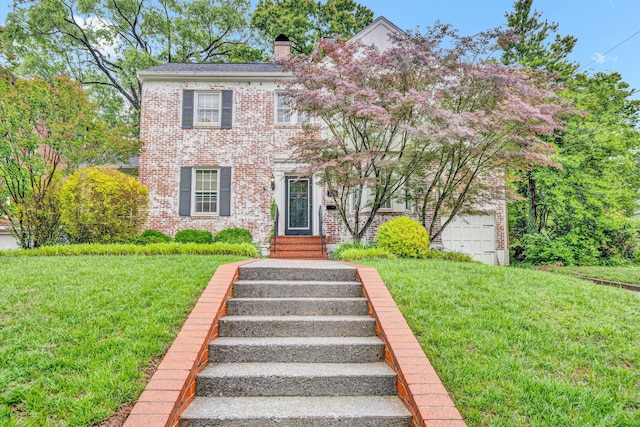 2408 Avenham Ave SW, Roanoke, VA 24014 - view of front of home with brick siding, a chimney, and a front yard