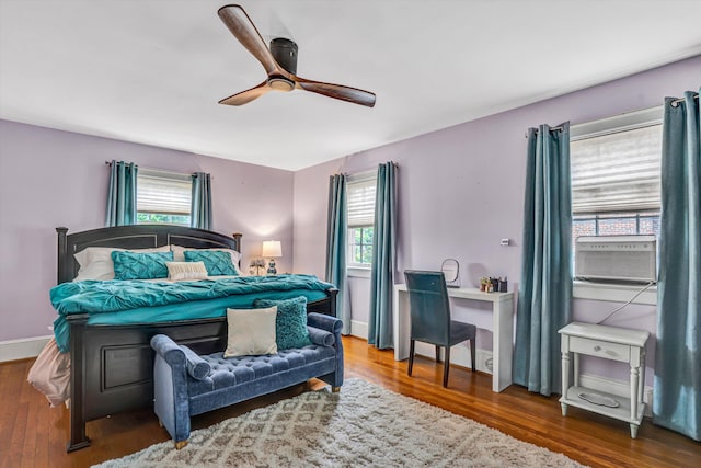 2408 Avenham Ave SW, Roanoke, VA 24014 - bedroom with wood finished floors, cooling unit, and ceiling fan