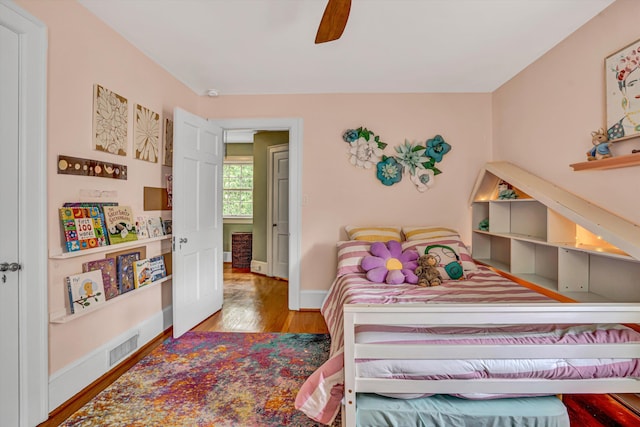 2408 Avenham Ave SW, Roanoke, VA 24014 - bedroom featuring wood finished floors, a ceiling fan, and baseboards