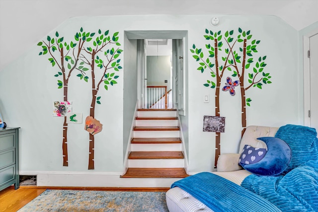 2408 Avenham Ave SW, Roanoke, VA 24014 - staircase featuring vaulted ceiling and wood finished floors