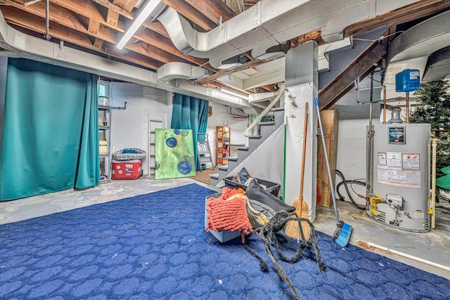 2408 Avenham Ave SW, Roanoke, VA 24014 - unfinished basement featuring gas water heater and stairs