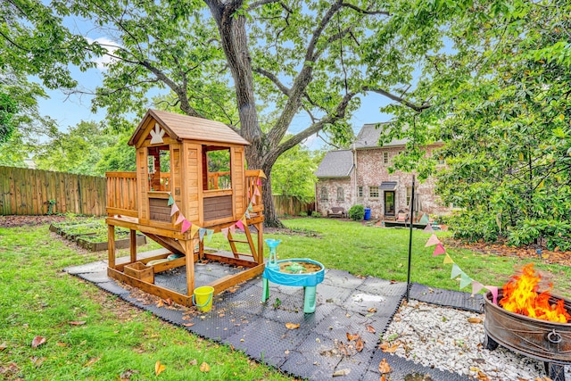 2408 Avenham Ave SW, Roanoke, VA 24014 - view of patio with an outdoor fire pit and a playground
