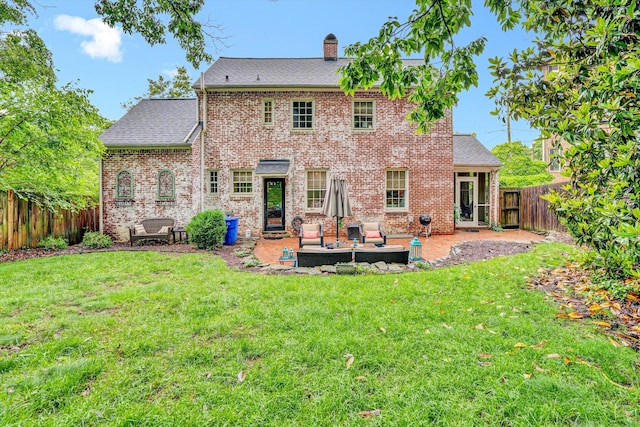 2408 Avenham Ave SW, Roanoke, VA 24014 - rear view of house featuring a patio, a chimney, brick siding, and roof with shingles