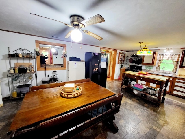 1652 Happy Acres Dr, Moneta, VA 24121 - dining space with ceiling fan and dark stone finish flooring