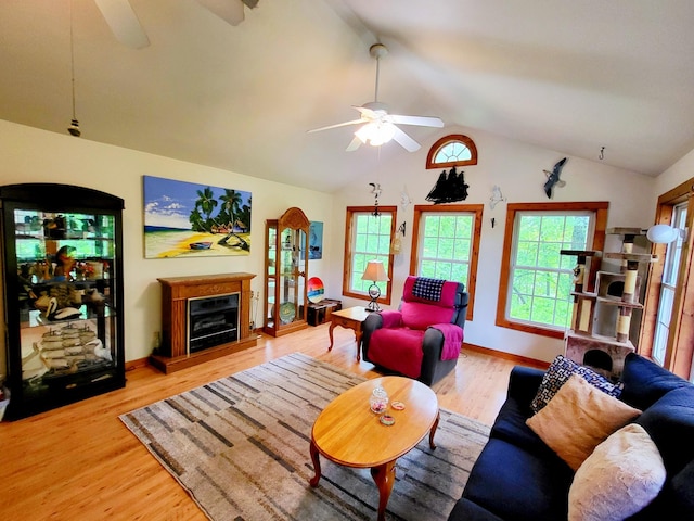 1652 Happy Acres Dr, Moneta, VA 24121 - living room featuring a ceiling fan, healthy amount of natural light, wood finished floors, and lofted ceiling