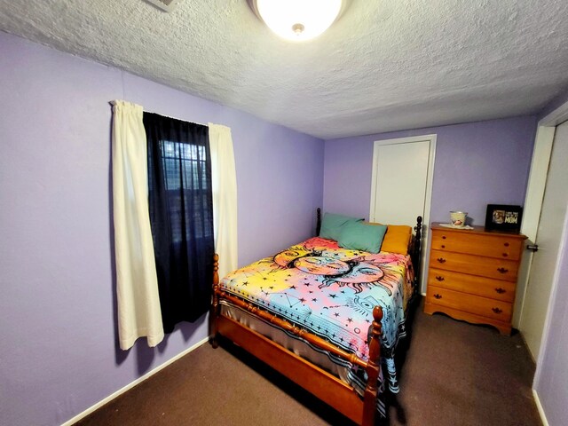 1652 Happy Acres Dr, Moneta, VA 24121 - bedroom with a textured ceiling, carpet floors, and baseboards