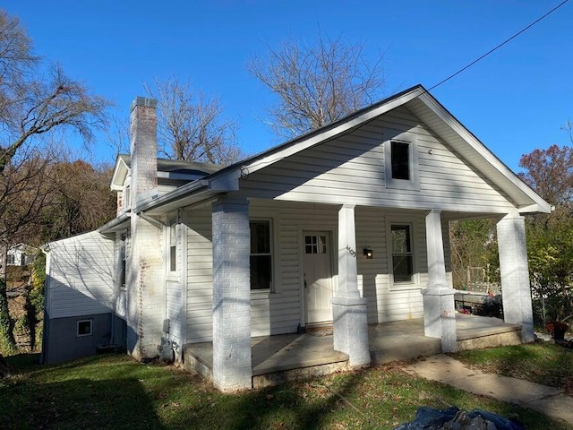 4705 Surrey Ave NW, Roanoke, VA 24017 - view of front of house with a porch and a chimney