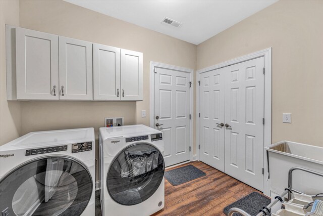 115 Professional Dr, Hardy, VA 24101 - laundry area featuring cabinet space, separate washer and dryer, and dark wood-style flooring