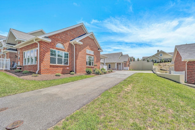 115 Professional Dr, Hardy, VA 24101 - view of front of house with driveway, brick siding, and a residential view