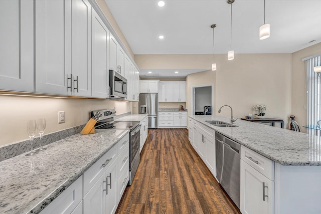 115 Professional Dr, Hardy, VA 24101 - kitchen featuring appliances with stainless steel finishes, a sink, white cabinets, recessed lighting, and pendant lighting
