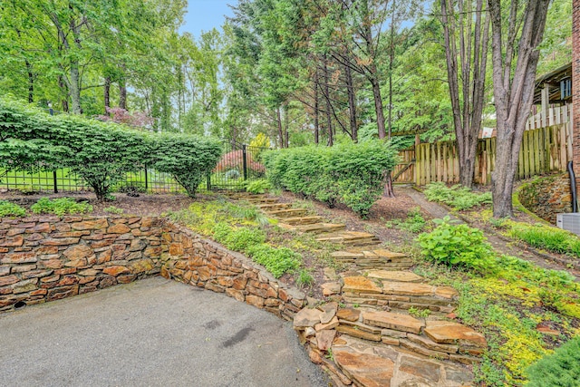 fenced backyard with a patio