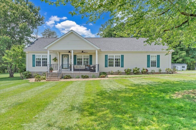 414 Mallard Cove Rd, Moneta, VA 24121 - view of front of property with ceiling fan, covered porch, a front yard, and roof with shingles