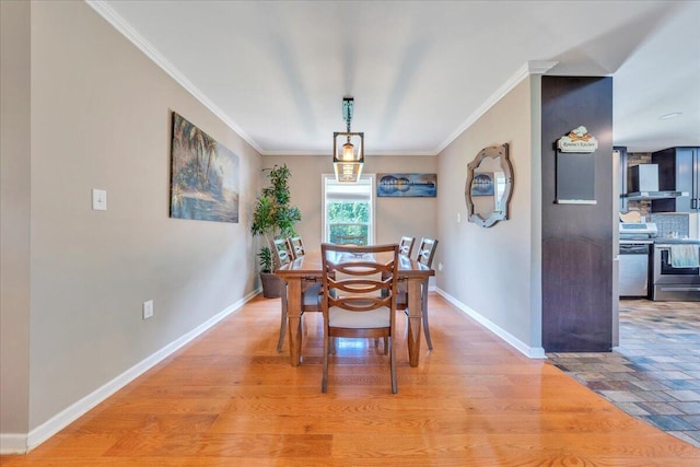 414 Mallard Cove Rd, Moneta, VA 24121 - dining room featuring ornamental molding, baseboards, and light wood-type flooring