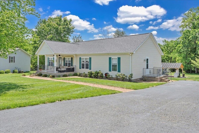 414 Mallard Cove Rd, Moneta, VA 24121 - ranch-style home with a front lawn, covered porch, ceiling fan, and a shingled roof