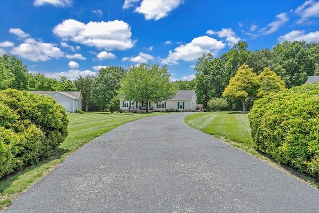414 Mallard Cove Rd, Moneta, VA 24121 - view of front of property with a front lawn, asphalt driveway, and view of scattered trees
