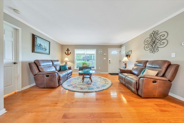 414 Mallard Cove Rd, Moneta, VA 24121 - living room featuring light wood finished floors, baseboards, and ornamental molding