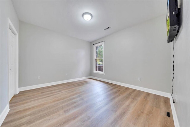 2521 Feather Garden Cir, Vinton, VA 24179 - unfurnished bedroom featuring light wood-style flooring and baseboards