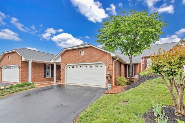 2521 Feather Garden Cir, Vinton, VA 24179 - ranch-style home featuring brick siding, driveway, and a garage
