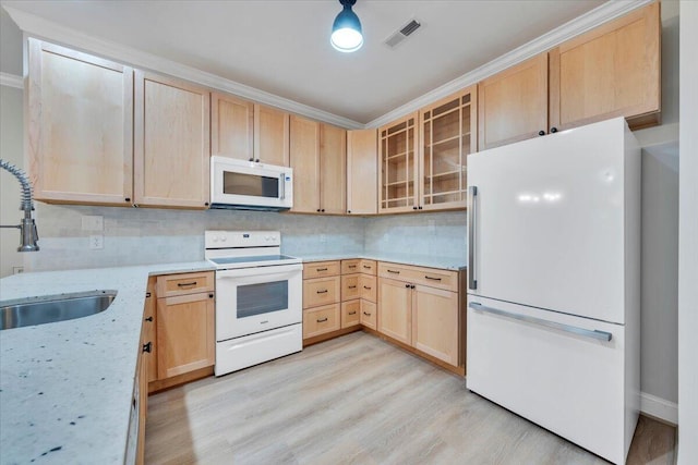 2521 Feather Garden Cir, Vinton, VA 24179 - kitchen featuring white appliances, light brown cabinetry, a sink, light wood-type flooring, and decorative backsplash