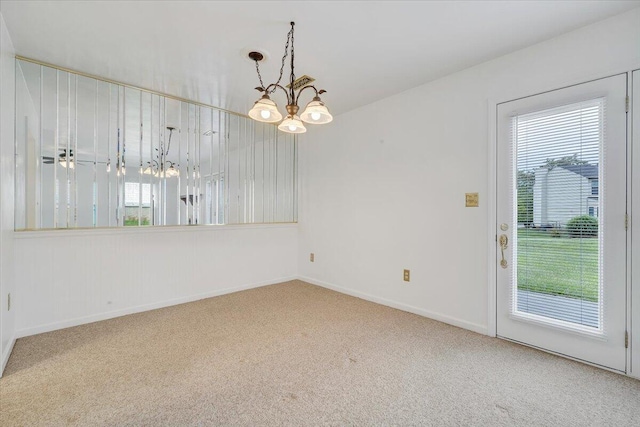 7204 Snowberry Cir, Roanoke, VA 24019 - unfurnished dining area with a chandelier, carpet flooring, and baseboards