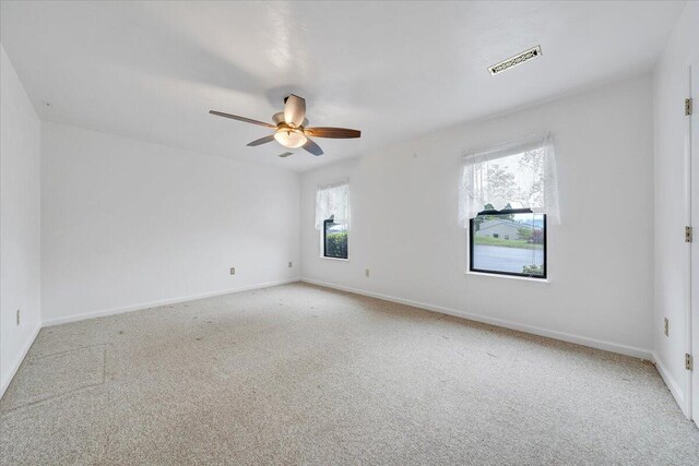 7204 Snowberry Cir, Roanoke, VA 24019 - unfurnished room featuring carpet floors, a ceiling fan, and baseboards