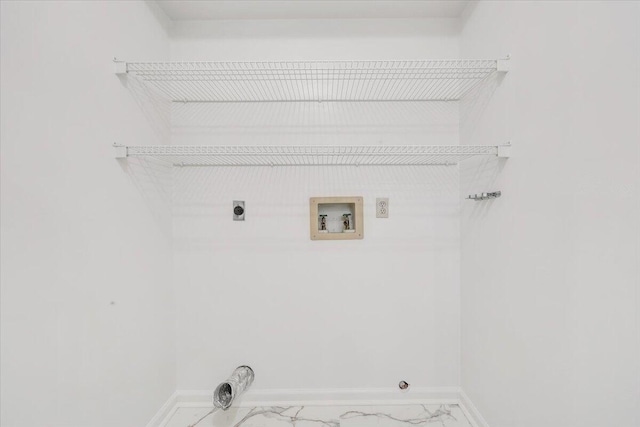 7204 Snowberry Cir, Roanoke, VA 24019 - clothes washing area with hookup for an electric dryer, marble look tile flooring, hookup for a washing machine, and baseboards